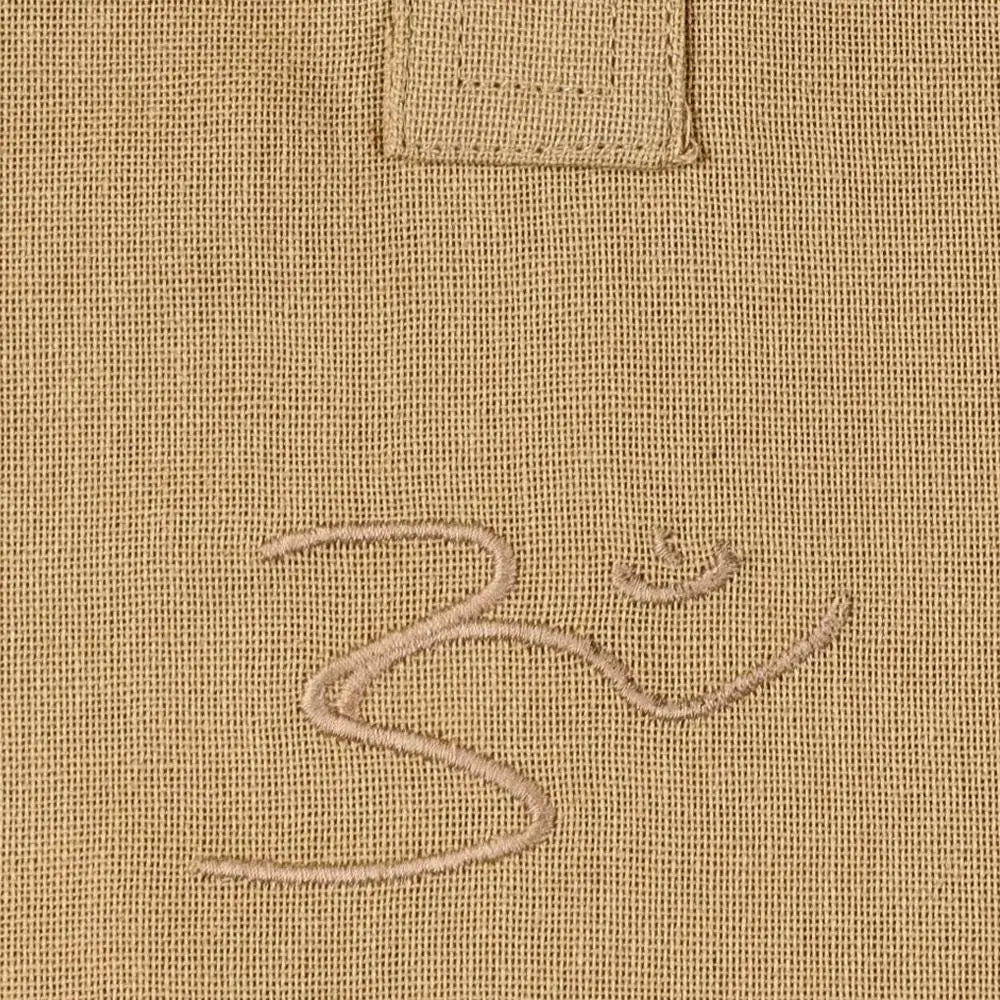 Men’s 100% organic cotton kurta with embroidered (Beige) "Aum". Short sleeved short kurta. Relaxed fit.